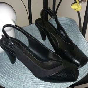 East 5th Snakeskin and patent, suede. Peep toe.